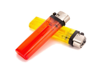yellow and red lighter on white background - obrazy, fototapety, plakaty
