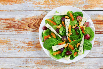 grape, blue cheese, spinach, dried apricots salad