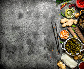 Asian food. A variety of ingredients for cooking Asian food on rustic background.