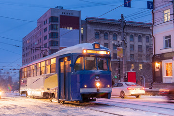Obraz premium KHABAROVSK, RUSSIA - JANUARY 14, 2017: Old tram in the street of winter city of Khabarovsk