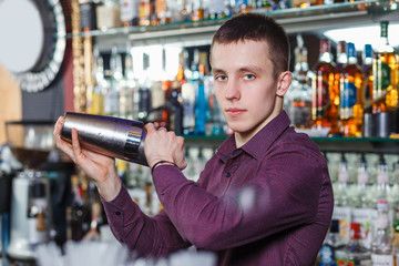 The bartender making cocktail