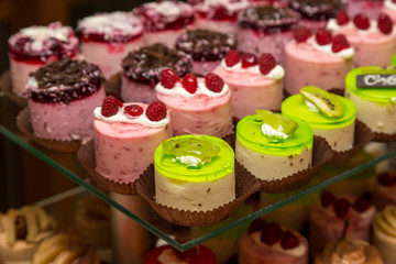 Dessert table for a party. Ombre cake, cupcakes. Candy bar