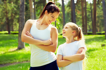 sporty mother and daughter