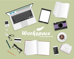 workspace with laptop, phone, notebook