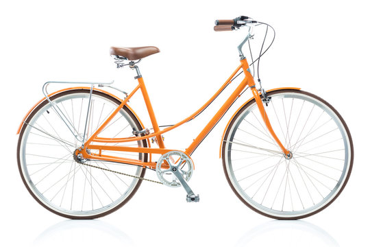 Fototapeta Stylish female orange bicycle isolated on white