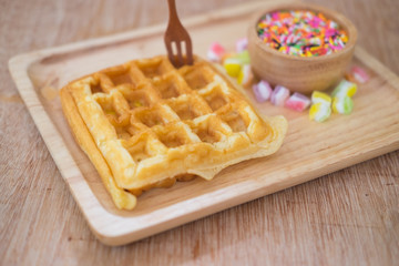 waffle on wood plate in cafe