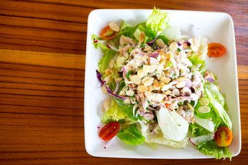 spicy tuna salad with lettuce on dish