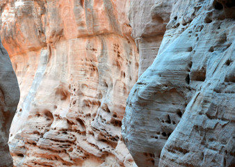 Narrow Path into a slot canyon, with rocks showing erosion, Valley of Fire in Nevada, USA
