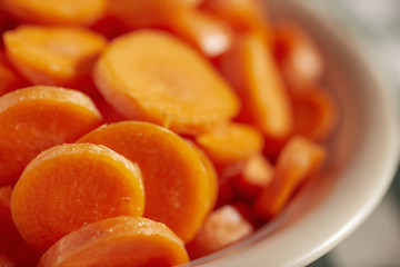slices of raw carrot, sometimes called 