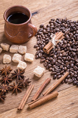 grains of black coffee on the wooden table