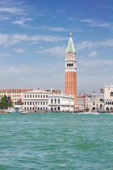 Fototapeta na wymiar famous San Marco bell tower and waterfront at summer day, Venice, Italy