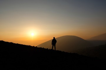 Fototapeta premium Taking in the view as the sun sets