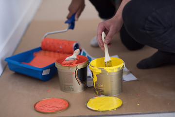 painters prepare color for painting