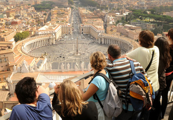 Tourists on the dome Saint Peter's cathedral in Vatican. - obrazy, fototapety, plakaty