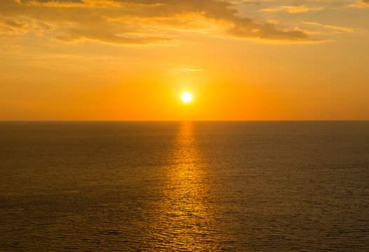Fototapeta Beautiful tropical sunrise in the sea.