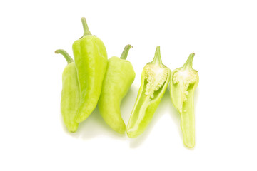 green chili peppers isolated on white background
