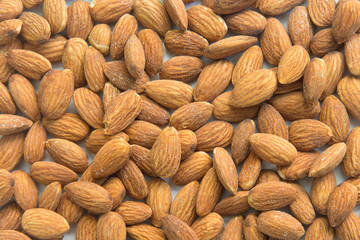 Peeled almonds closeup. For vegetarians.