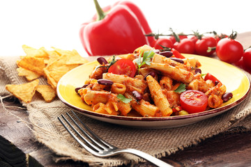chilli con carne and penne with tomato kidney beans