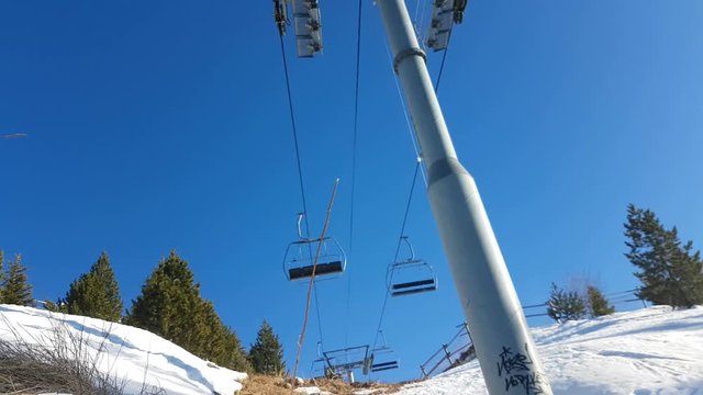 Empty Ski Lift Or Chairlift in Motion Over Snow Mountain - Ski Resort in France 4K Video
