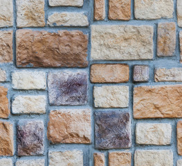 Seamless texture of the wall of rubble stone.