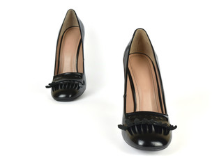 Pair of Black High Heel Loafer Shoes in a Step Pose