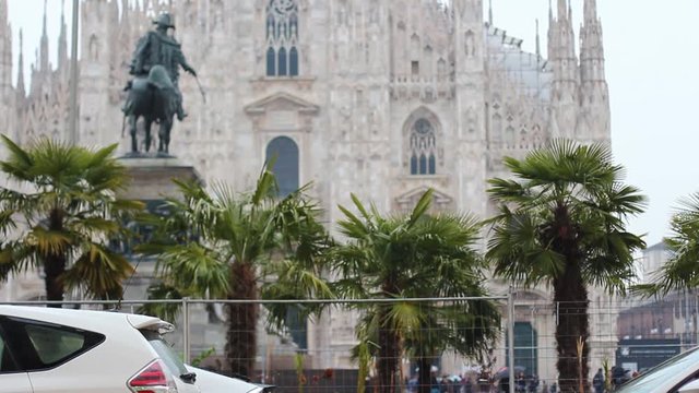 people, vittorio emanuele II and palm trees in milan's duomo