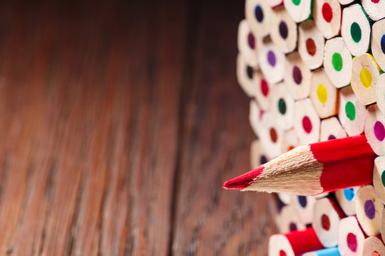 One Sharpened Red Pencil Among Many Ones