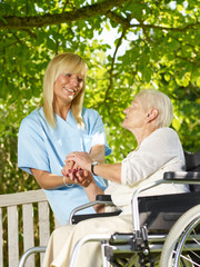Carer and elderly person