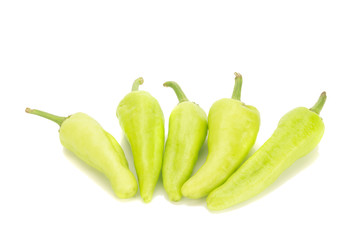 green chili peppers isolated on white background