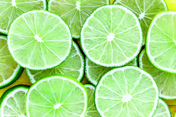 Fototapeta na wymiar Fresh lime slices background