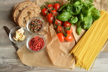 Italian background with bread, tomatoes, basil and spices