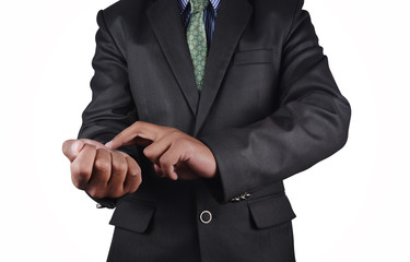 Business man checking vein in black suit isolated on white background
