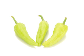 green chili peppers isolated on white background