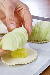 Cook puts an apple on the dough full meal recipe cheesecake