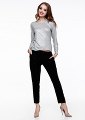 Fototapeta premium Beautiful fashion model wearing silver top