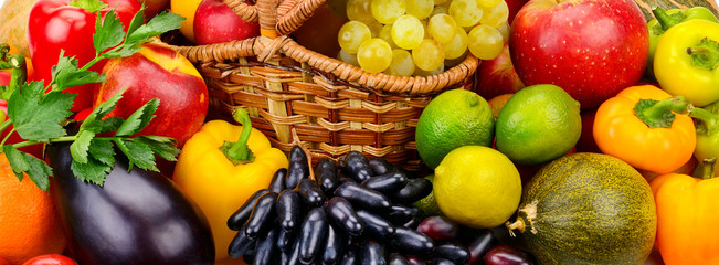 Basket with fresh fruits and vegetables 