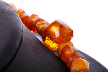amber necklace on white background