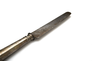 Vintage table knife on a white background