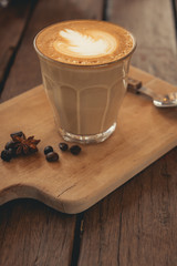 vintage hot latte on wood table