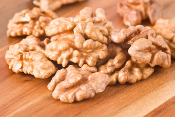 Walnuts on wooden board