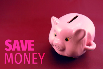 Piggy bank and sign Save money