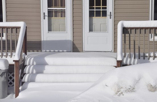 Lots of snow in front of the house