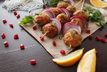 Kofta skewers, meatballs and red onion delicious oriental cuisine, top view