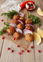 Kofta skewers, meatballs and red onion delicious oriental cuisine, top view