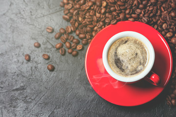 Cup of coffee on stone background