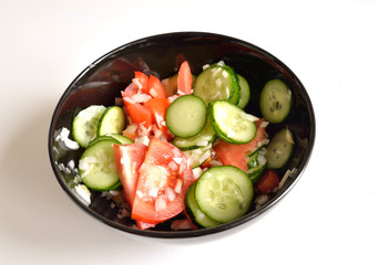 Salad with cucumbers and tomatoes.