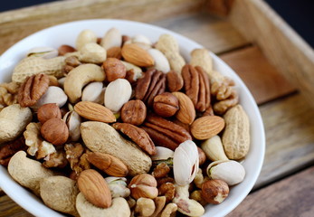 Assorted mixed nuts, peanuts, almonds, walnuts, pistachios, pecan, cashew, hazelnuts