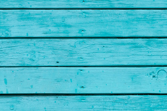 Texture Of Old Wooden Planks With Peeling Blue Paint.