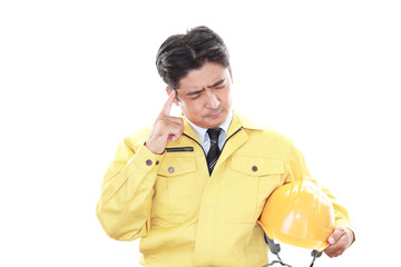 頭痛を訴える男性
