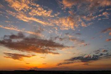Fototapeta premium sunset over the field